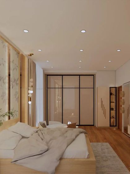 Another view of the minimalist bedroom, showing the large glass-fronted wardrobe and the clean, open feel of the space.