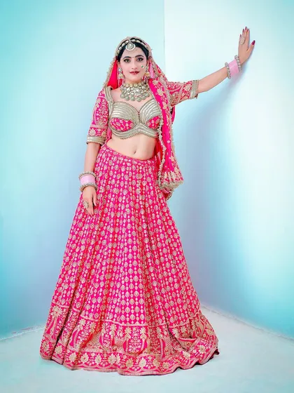 Using a simple colored background in the studio to add a pop of modern style to a traditional bridal portrait.