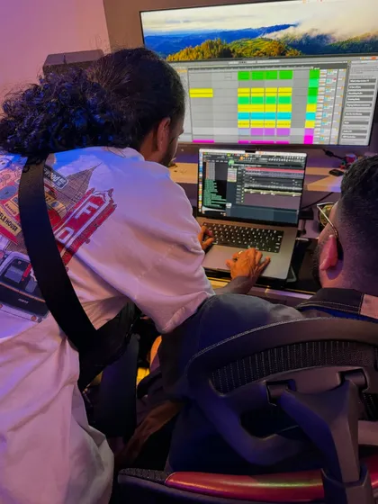 Collaboration is key. Here I am in the studio with another artist, working on a track together. Bouncing ideas off other creative people is one of the best parts of the production process.