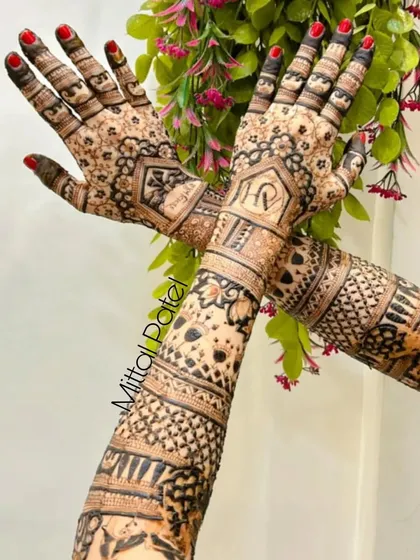 Another angle of the bridal back-hand design, showing the personalized initials and motifs.
