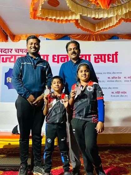 I stand proudly with our little champions, Sharayu and Swaroop, as they show off their bronze medals from the Under 9 State Archery Competition.