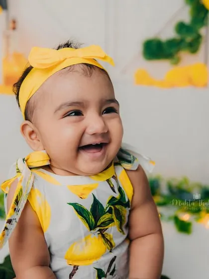 A big, happy laugh from this sweet girl. The lemon theme is so bright and cheerful, just like her smile.