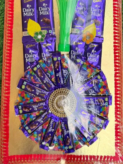 The base of our grand chocolate mala features a beautiful wheel of chocolates, making it look as good as it tastes.