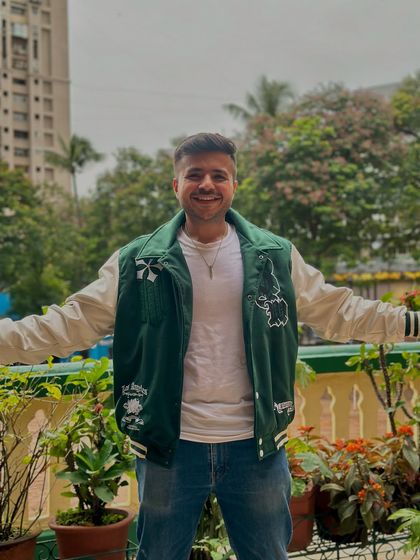 A picture of me feeling happy and proud after a successful show. Bringing a creative vision to life with students is one of the most rewarding parts of my job.