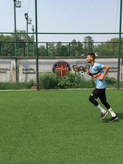 A player works on his stamina and running form on the turf, an essential part of the physical conditioning I provide.
