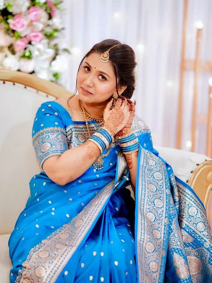 Sushmita looking regal on her engagement day. The classic updo and traditional jewelry complete this timeless look.