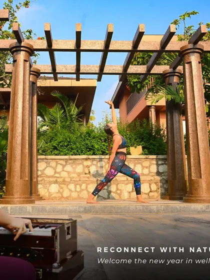 Reconnect with nature and yourself. Our outdoor Aurora Deck provides a peaceful setting for wellness activities like Vinyasa Yoga, allowing you to find balance with the sounds of nature and live harmonium music.