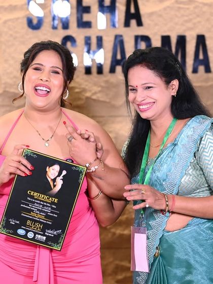 Celebrating another student's success. Holding this certificate is the first step in her new journey as a professional makeup artist.