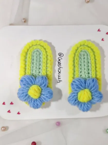 Korean-style flower hairclips with a two-tone design of light green, yellow, and blue.