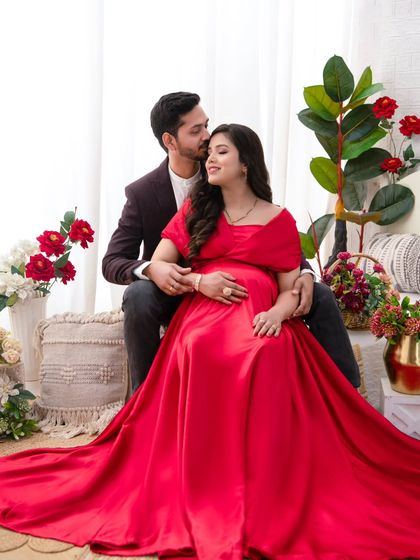 A tender moment captured as the husband whispers to his wife. These candid interactions are what make a maternity session so personal and memorable.