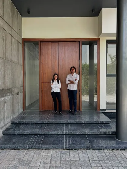 My co-founder and I standing at the entrance of the House of Passages. For me, architecture is a collaborative and personal journey. This image captures a moment of pride at a project site, reflecting our hands-on approach from the first sketch to the final walkthrough.