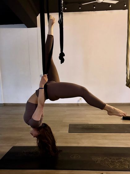 A gentle inversion perfect for winter wellness. This pose helps maintain flexibility and relaxation, allowing you to connect with your body during the colder months.