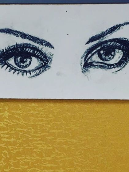 A simple charcoal sketch focusing only on the eyes. So much of a person's story can be told through their eyes, and I often practice capturing their expression.