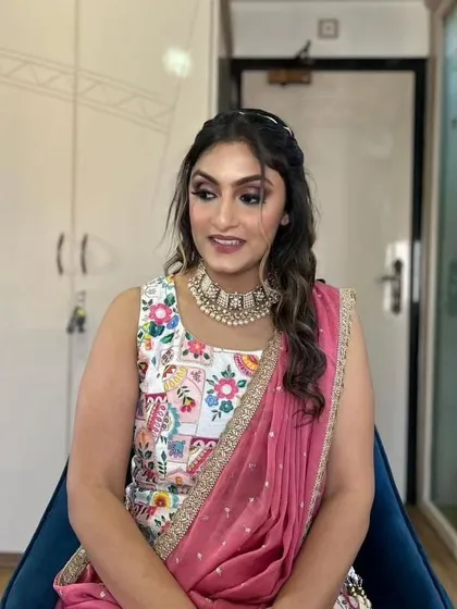 A glamorous look for a Garba night. The smokey eye and glowing skin are perfect for an evening of dance and celebration.
