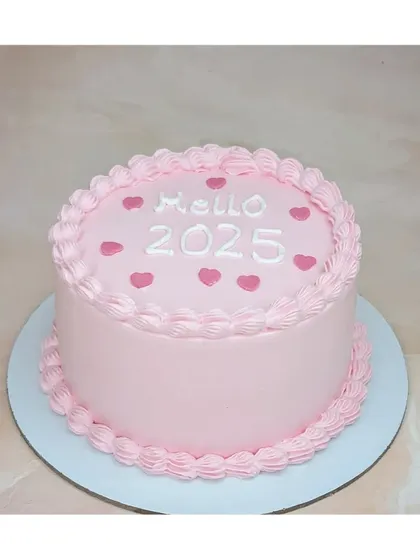 A simple pink cake for the New Year. This fresh pineapple cake says "Hello 2025" and is perfect for a small, hopeful celebration.