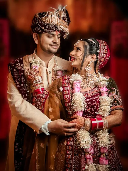 A perfectly composed couple portrait showcasing their regal wedding attire. Our goal is to create timeless images that you will cherish forever.