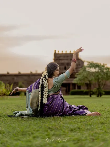 Dance is not just for the stage; it is a way of life. This artistic shoot at a temple, inspired by the song 'Vanathi', captures the poetic and timeless beauty of classical dance in a natural, serene setting.