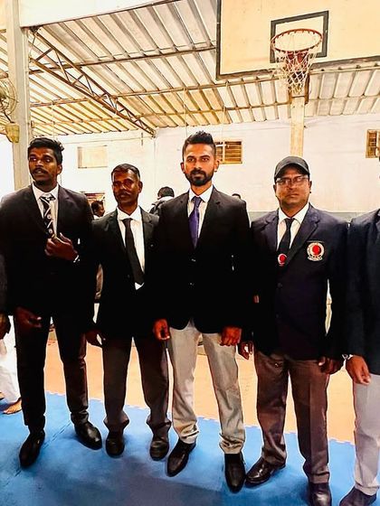 Standing with my fellow referees. We are entrusted to ensure fair play and uphold the integrity of the competition.