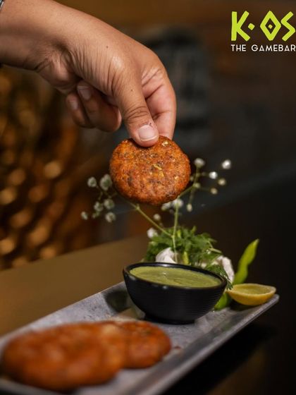 Dip it and enjoy. Our crispy patties are served with a fresh green chutney that perfectly complements the flavor.