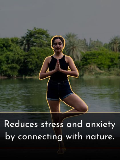 Connecting with nature, like doing yoga by the lake, is a great way to reduce stress and anxiety.