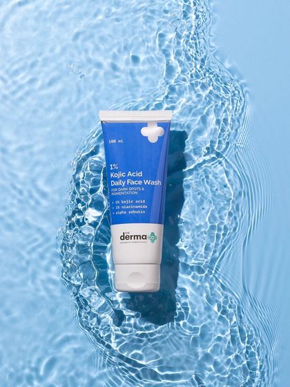 A top-down shot that uses water ripples to create a beautiful, natural texture. The face wash appears to float in a clear blue pool, reinforcing its cleansing and hydrating benefits.