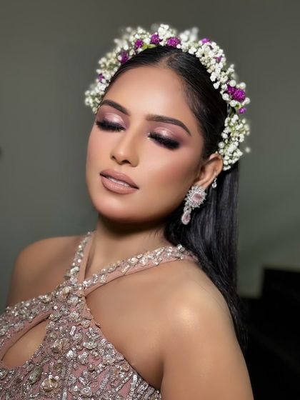 A close-up of the eye makeup from the Hollywood glam look. The purple smokey eye is blended to perfection.