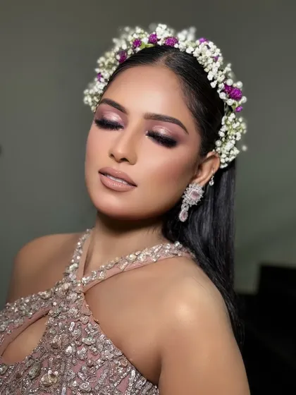 A close-up of the eye makeup from the Hollywood glam look. The purple smokey eye is blended to perfection.