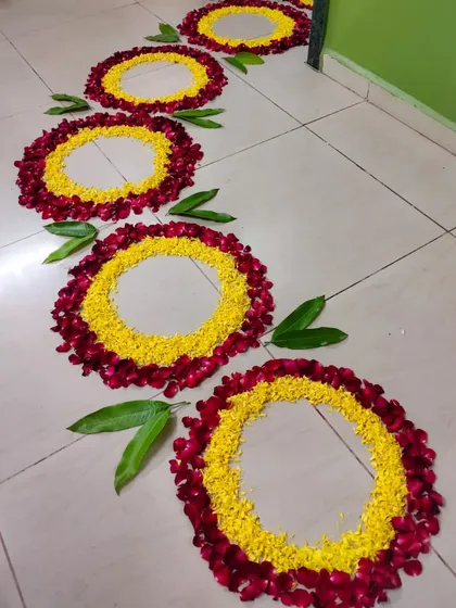 A closer look at the floral rangoli circles I designed for a bride's 'Griha Pravesh'. It's a simple, beautiful, and traditional way to welcome a new family member.
