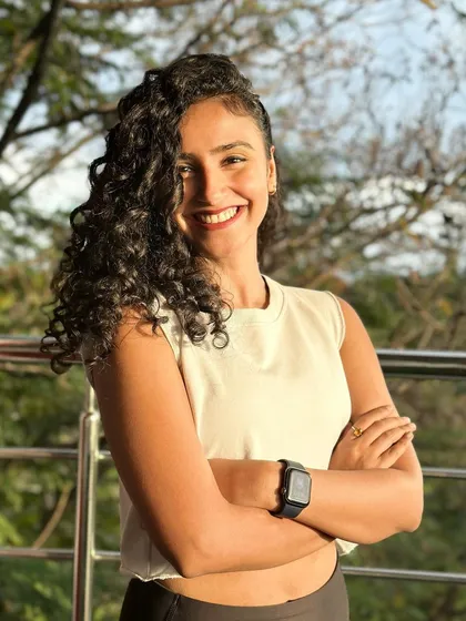 This smile comes after a year of deep learning and resilience. My personal journey through pain and surrender is what led me to create these sessions. I found my way back to the light through movement, and I want to help you find yours too.