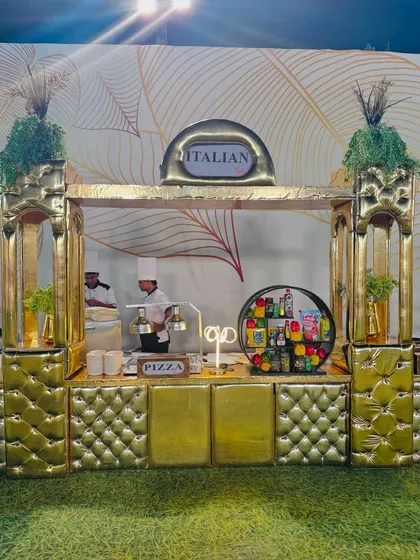 The magnificent golden Italian counter, designed to make a statement with its opulent, tufted-leather look and grand arches.