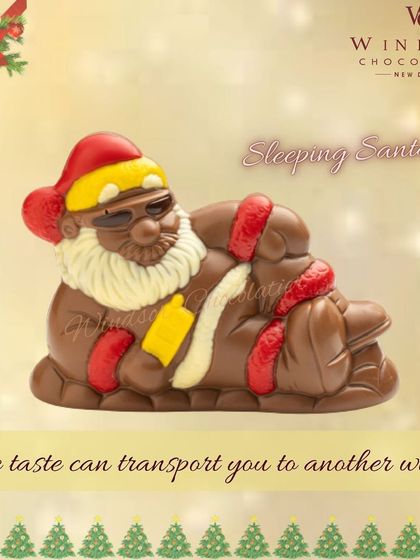 A playful take on a holiday icon, this 'Sleeping Santa' sculpture is a fun and unique chocolate treat for the Christmas season.