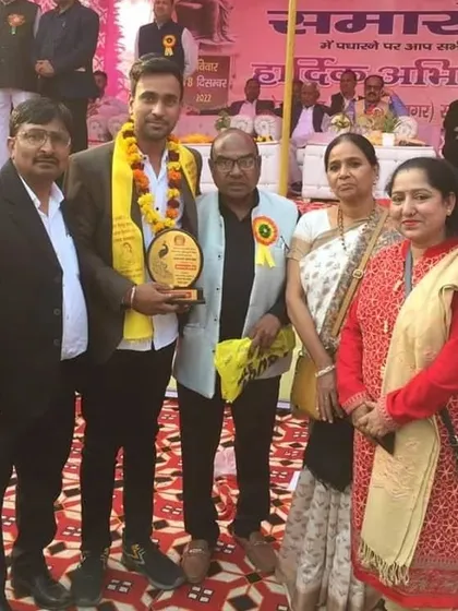 A group photo with respected community leaders in Delhi after being honored for my artistic contributions.