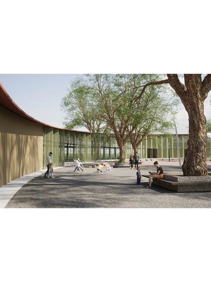 A street-level view from the 18th-century palace renewal project, showing a new public courtyard shaded by existing trees. The design aims to create a comfortable and engaging environment for community activities.