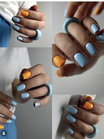 A fun and playful color combination of baby blue and bright orange for a unique and eye-catching manicure.