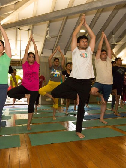 New beginnings, new possibilities. This image of students in Tree Pose (Vrksasana) announces our upcoming beginner batch, a journey of strength, flexibility, and inner peace.