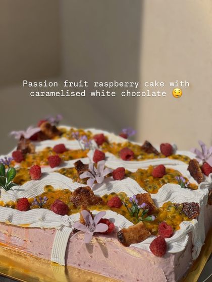 Our Passion Fruit Raspberry cake with caramelized white chocolate. The textures and flavors in this cake are a truly unique experience.