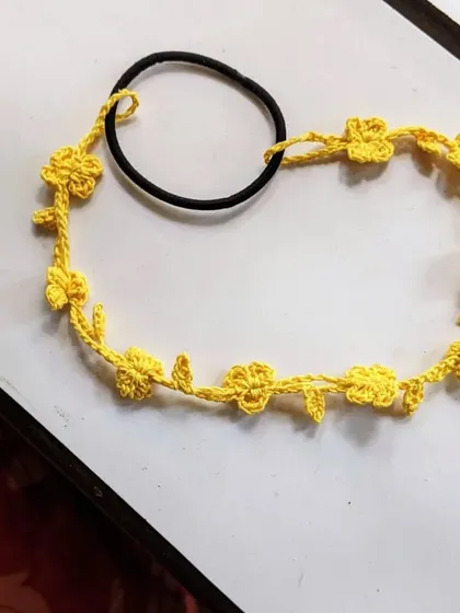 We also offer the floral hairband in bright, happy colors like this sunny yellow. Just let us know what color you'd like for your custom hair accessory.