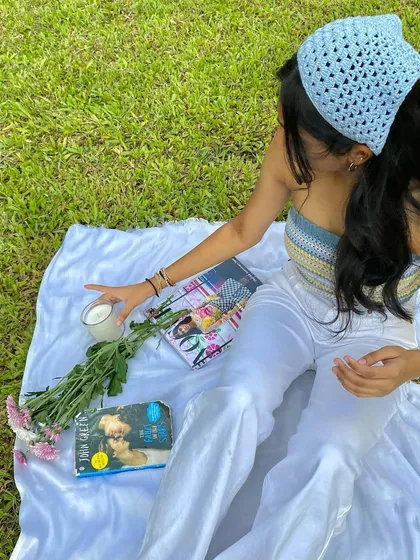 Creating a dreamy picnic scene with our custom tube top and bandana. All our pieces are designed to be mixed and matched.