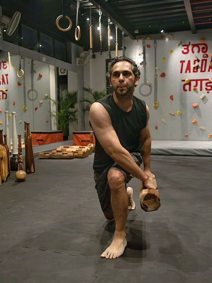 A moment of concentration during a workout. Our training is not just physical, it's mental. It requires you to be present and connected to your body.