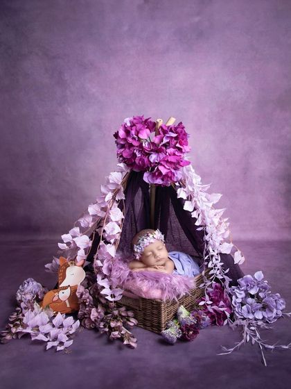 My little ray of sunshine. This beautiful floral tent setup in shades of purple is a perfect, dreamy escape for a sleeping princess.