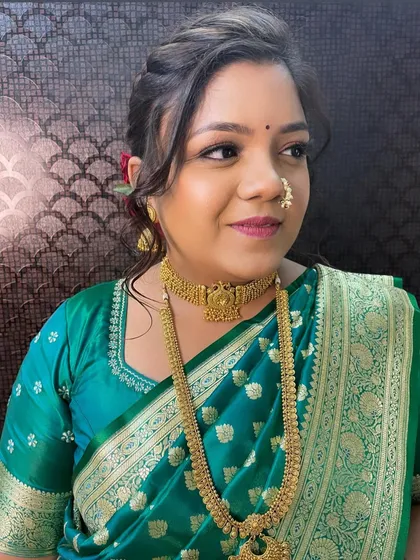 A soft and shimmery engagement look, with a focus on glowing skin and beautifully defined eyes.
