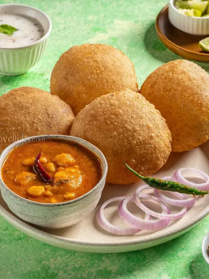 A plate of Bedmi Puri with Aloo Sabzi, a classic breakfast from North India, shot for Gulab Sweets.