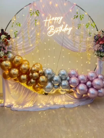 The complete setup of the round birthday backdrop, ready for photos and celebrations.