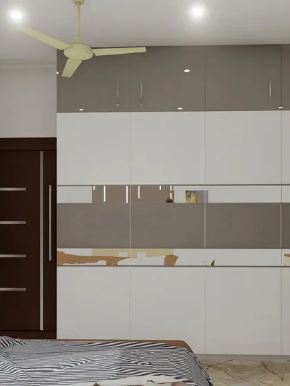 This view shows the full length of the wardrobe and its mirrored accent, which adds functionality and a sense of space to the room.