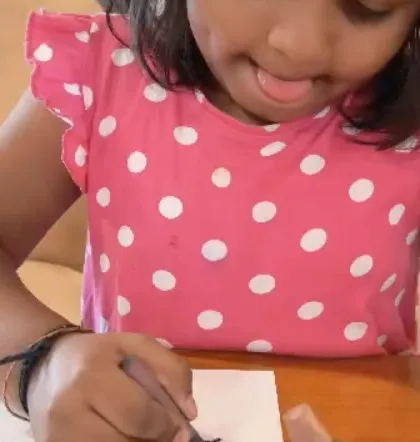 The look of pure concentration. This student is completely in the zone, showing the therapeutic and focusing power of creating art.