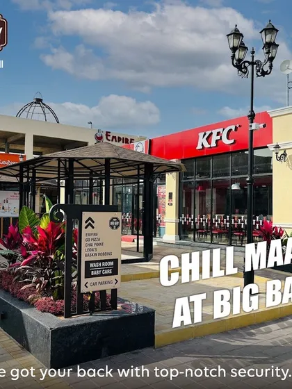 Chill Maadi at Big Bay. This image of our KFC and GoPizza outlets includes a signpost pointing to the washroom, baby care, and parking, assuring you of our top-notch facilities and security.