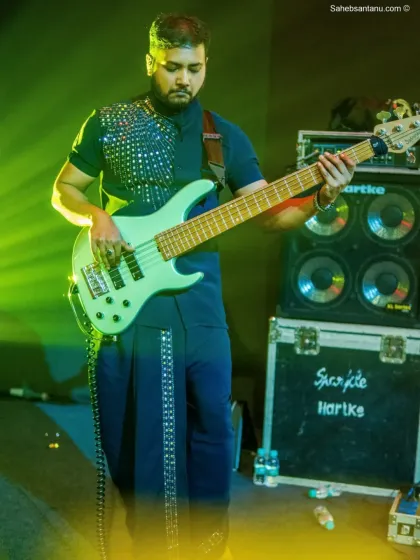 Our bassist in his element, providing the solid groove that underpins our sound.