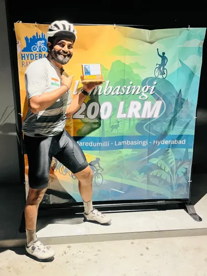 The joy of accomplishment. A finisher celebrates after completing the grueling Lambasingi 1200K LRM, a ride that traverses pristine forests and the misty heights of the "Kashmir of the South."