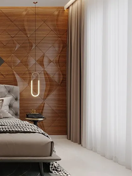 A full view of the bedroom with the 3D wood-paneled wall. The tufted headboard, modern pendant light, and soft drapery complete this elegant and thoughtfully designed sleeping space.