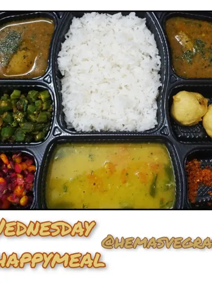 This Wednesday meal included simple dal and rice, drumstick gravy, bhindi sabzi, batata wada with chutney, and a refreshing corn and beet salad.